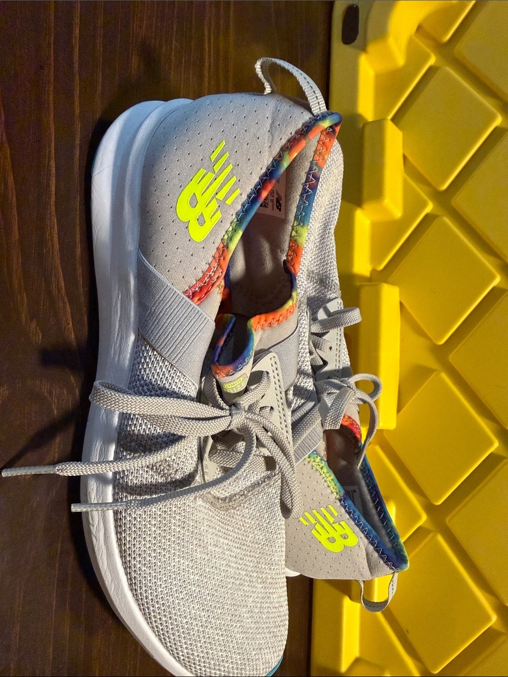 New Balance Woman’s ' Light Gray Sneakers with Neon Yellow Logo and Rainbow Trim
